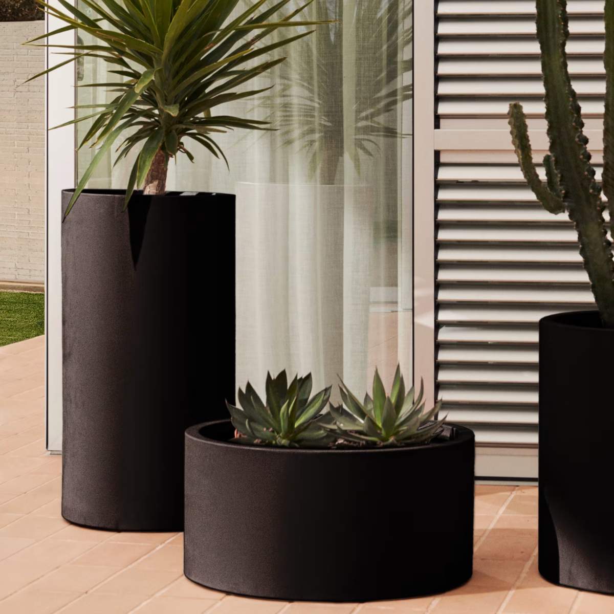 Kave Home Aiguablava brown cement planter Ø 42cm