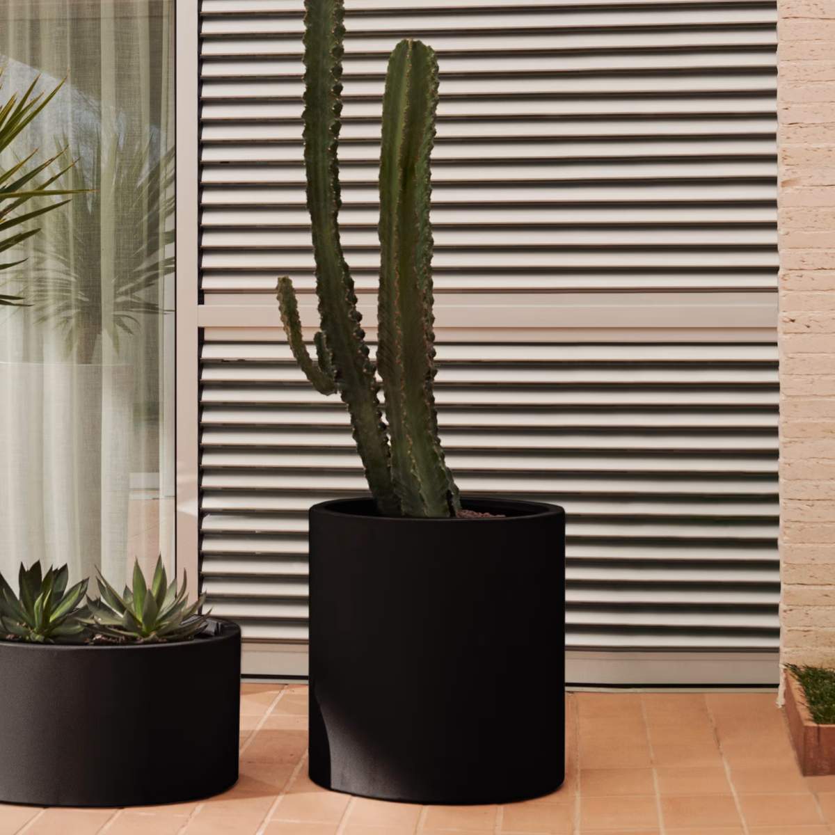 Kave Home Aiguablava brown cement planter Ø 52cm