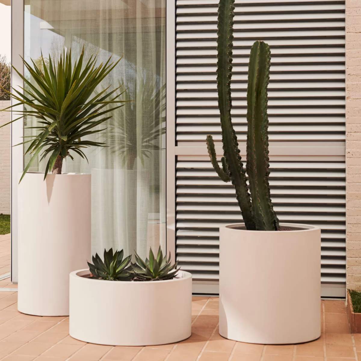 Kave Home Aiguablava brown cement planter Ø 52cm