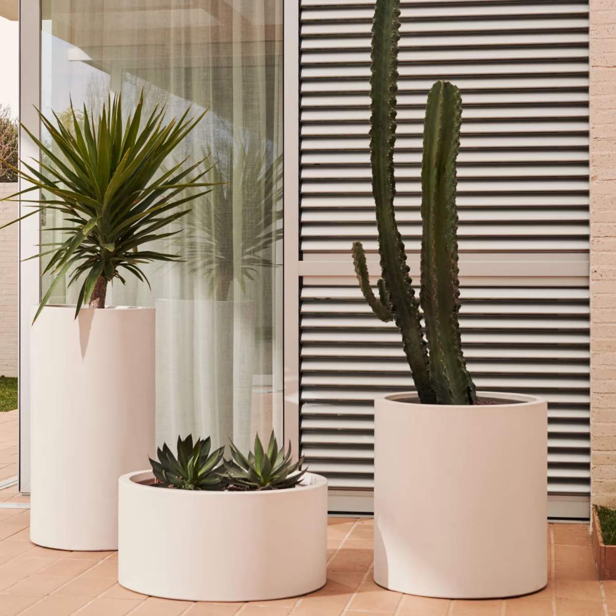 Kave Home Aiguablava brown cement planter Ø 42cm