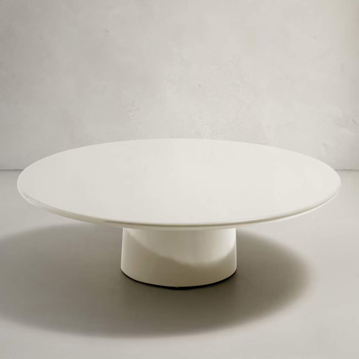 Kave Home Albanella coffee table in cement with glossy green finish Ø110cm