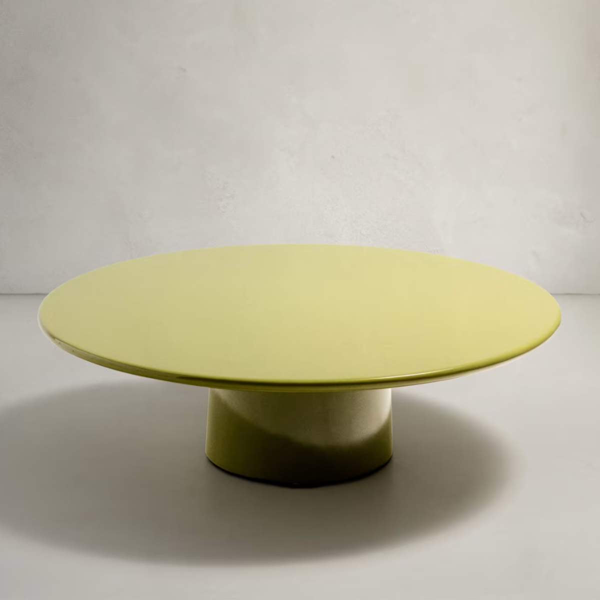 Kave Home Albanella coffee table in cement with glossy green finish Ø110cm