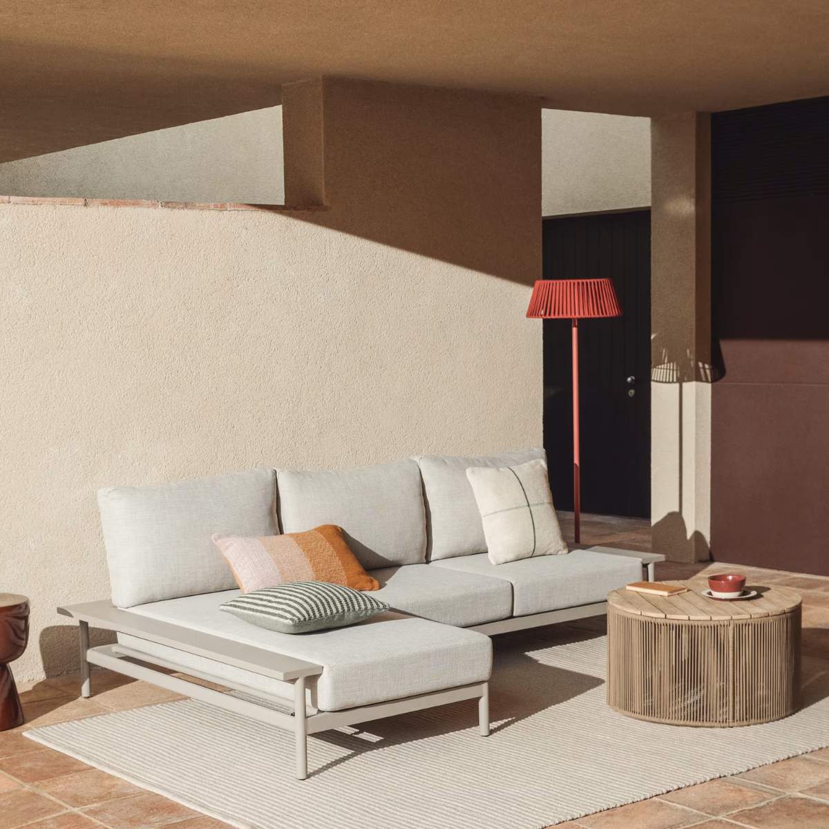 Kave Home Aldet outdoor solar floor lamp in terracotta flat rope cord with metal stand Ø46cm