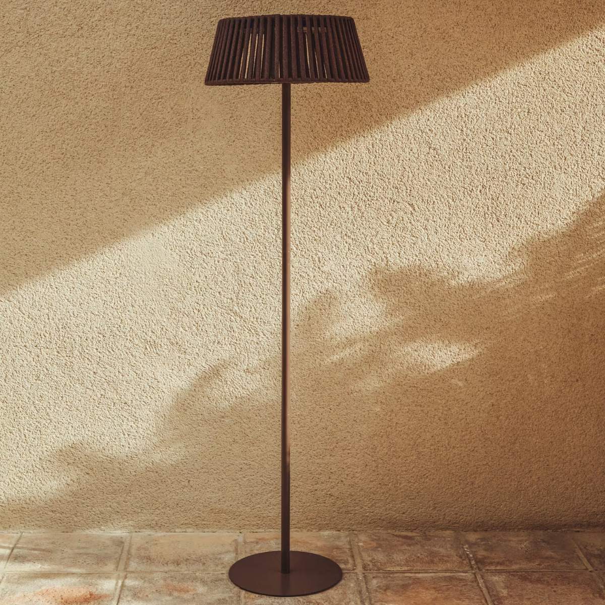 Kave Home Aldet outdoor solar floor lamp in terracotta flat rope cord with metal stand Ø46cm