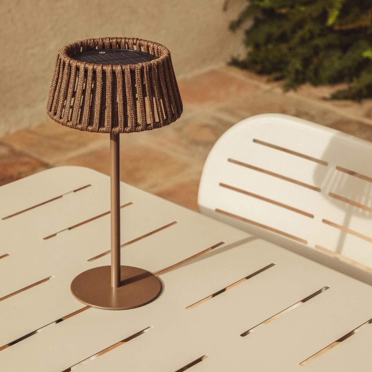 Kave Home Aldet outdoor solar table lamp in terracotta flat rope cord with metal stand