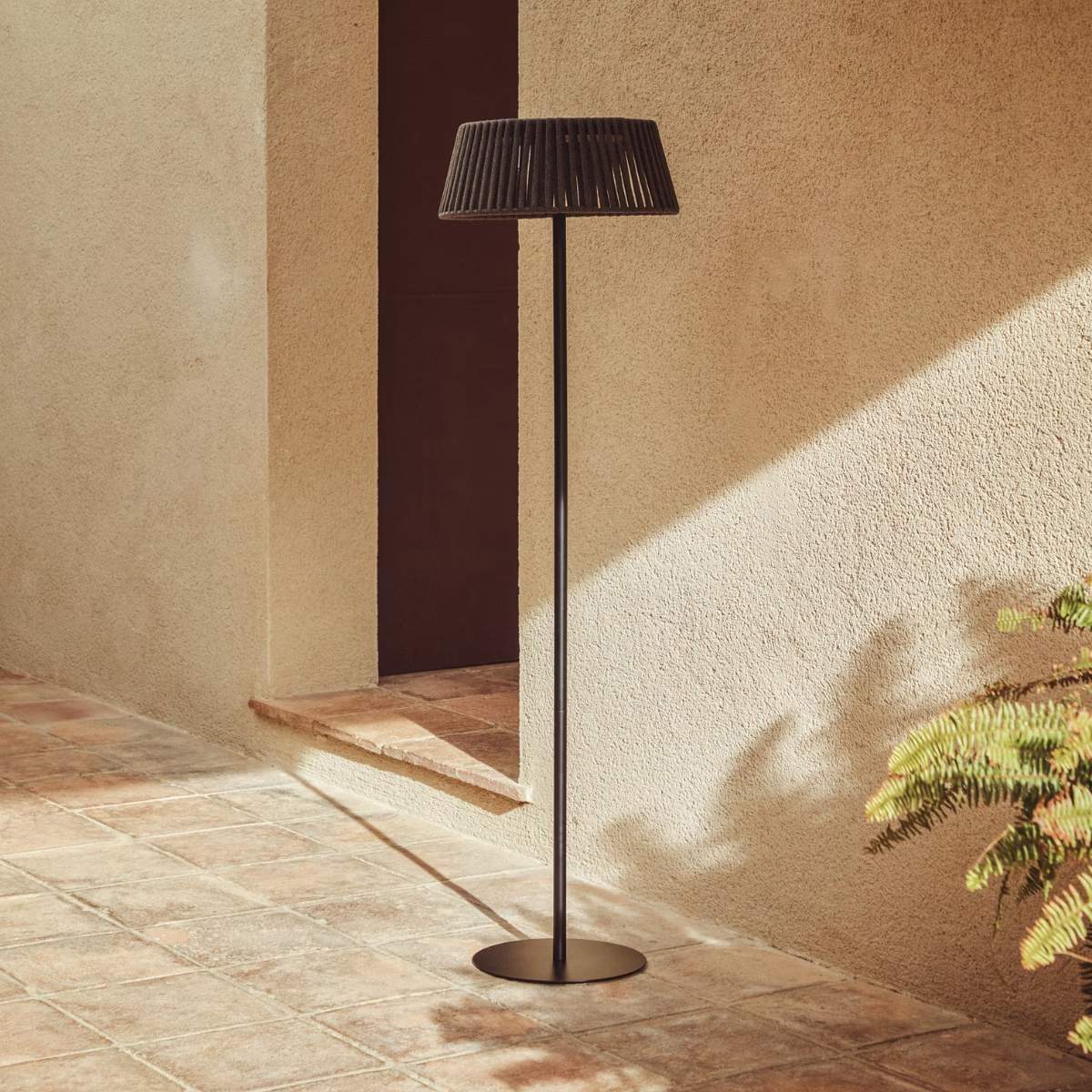 Kave Home Aldet outdoor solar floor lamp in terracotta flat rope cord with metal stand Ø46cm