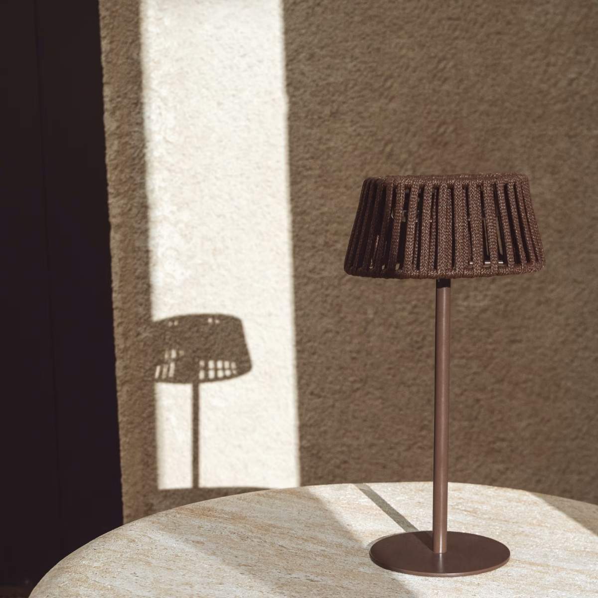 Kave Home Aldet outdoor solar table lamp in terracotta flat rope cord with metal stand