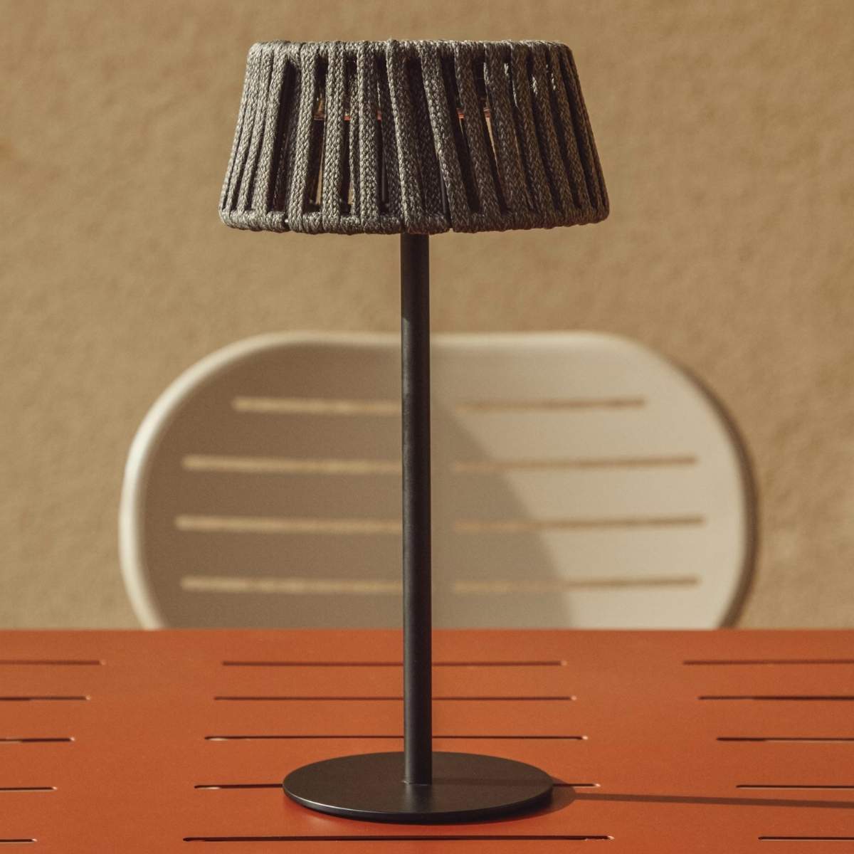 Kave Home Aldet outdoor solar table lamp in terracotta flat rope cord with metal stand