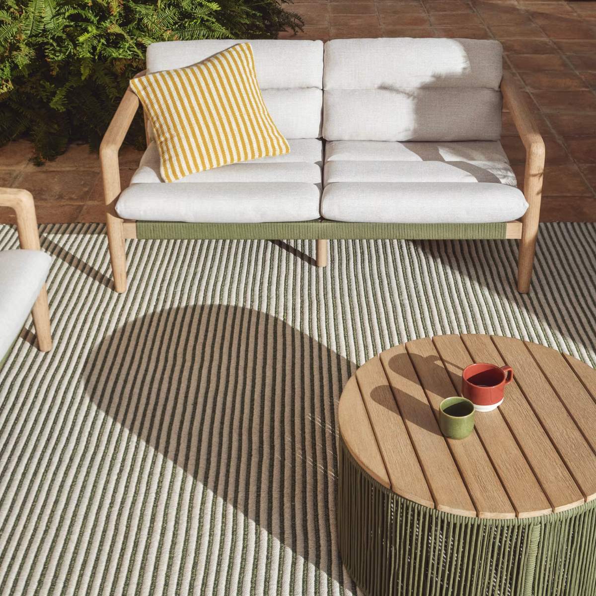 Kave Home Ardelia green and beige synthetic fibre rug 160 x 230cm.