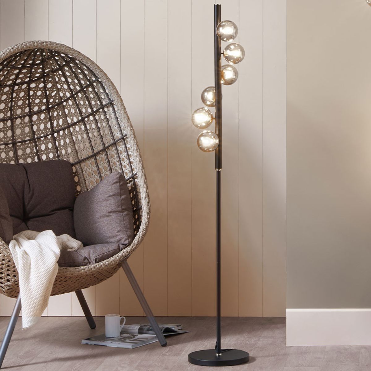 Pacific Lifestyle Blair Smoke Glass Ball and Black Metal Floor Lamp