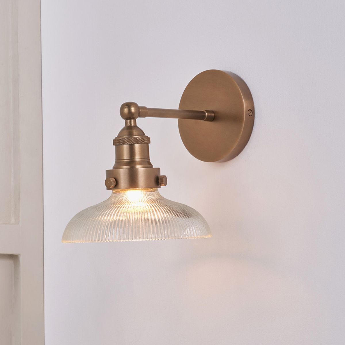 Pacific Lifestyle Bowery Ribbed Glass with Antique Brass Fitting Wall Light