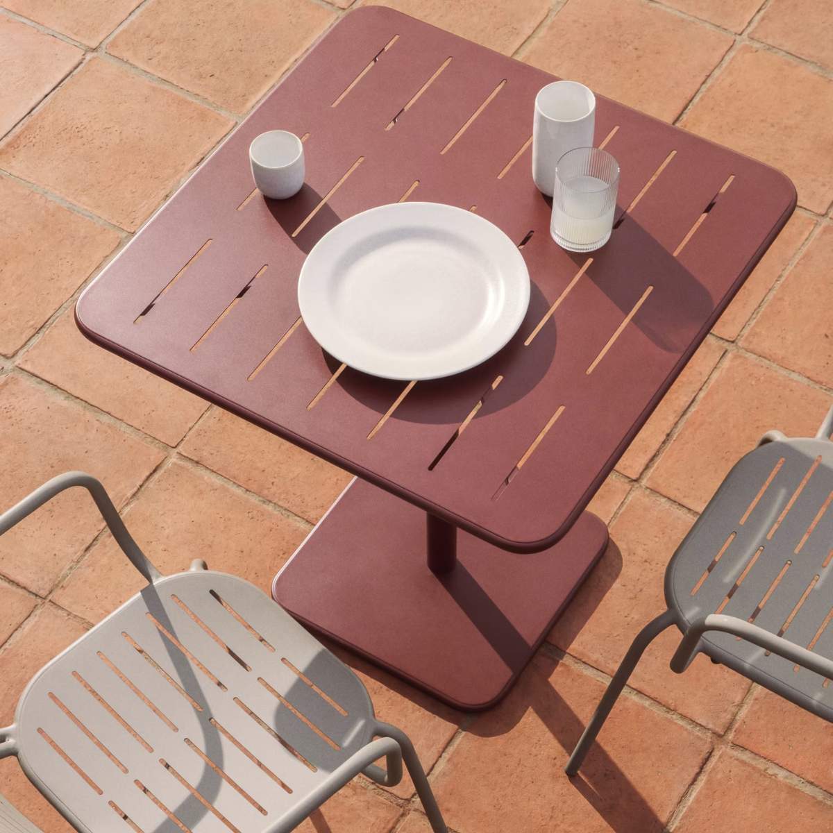 Kave Home Brai outdoor table in burgundy galvanised steel 70 x 70cm
