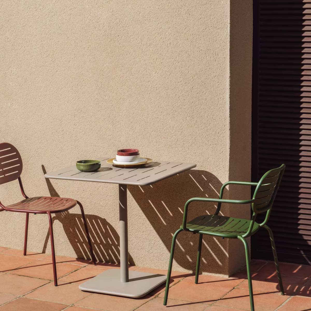 Kave Home Brai outdoor table in burgundy galvanised steel 70 x 70cm