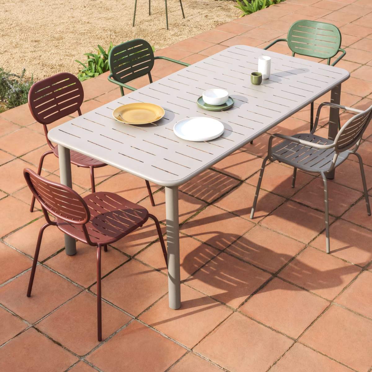 Kave Home Brai stackable outdoor chair with armrests in taupe galvanised steel
