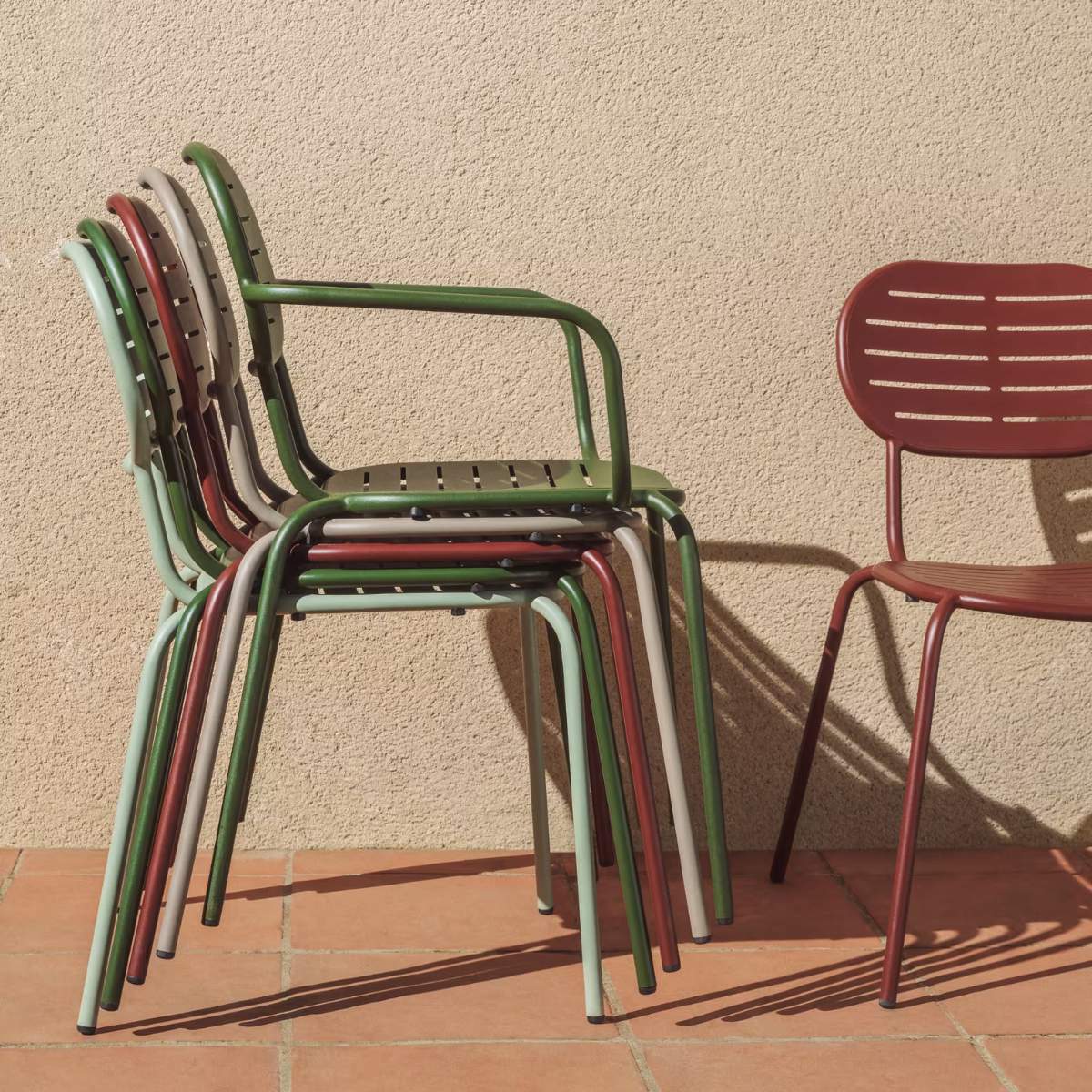 Kave Home Brai stackable outdoor chair in burgundy galvanised steel