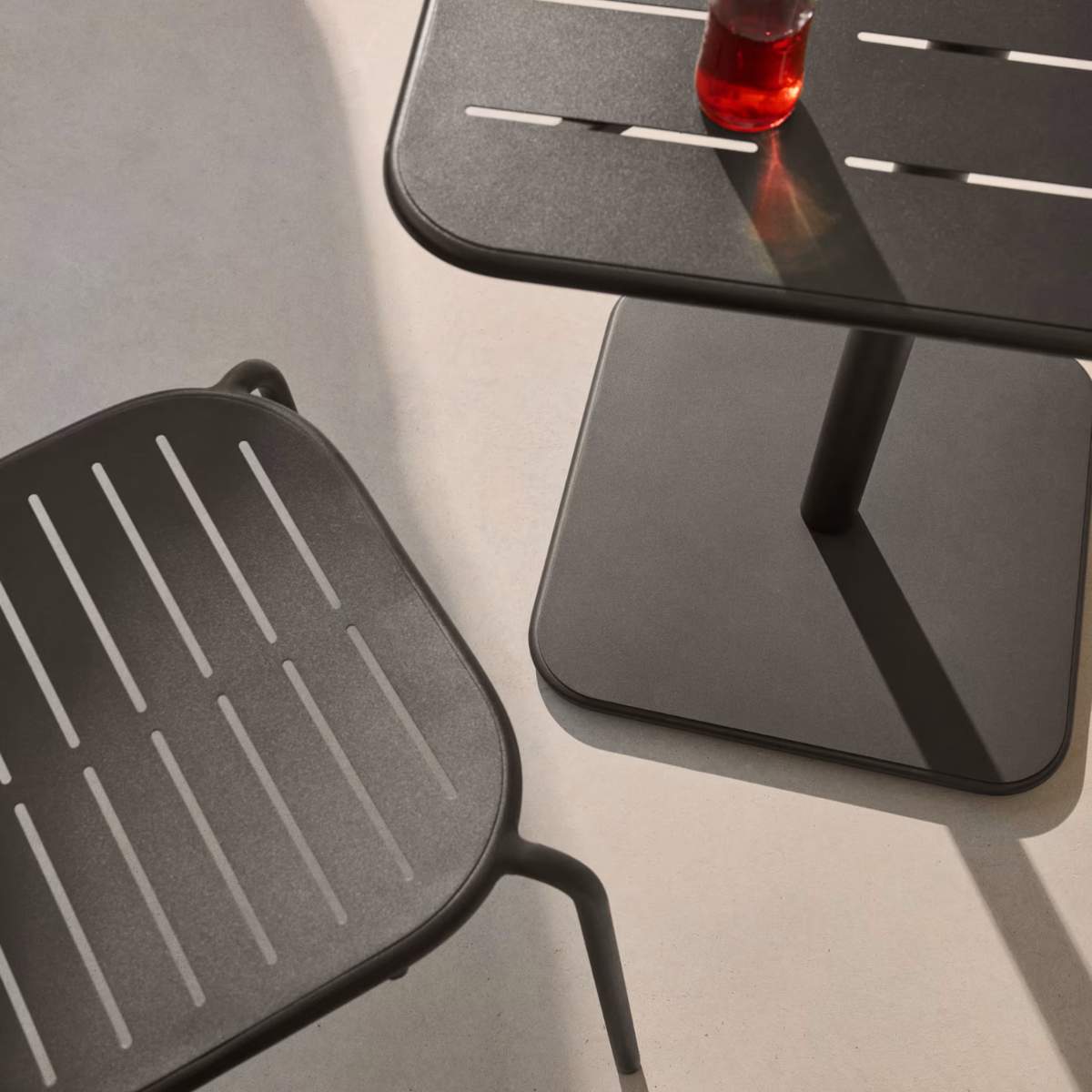 Kave Home Brai outdoor table in burgundy galvanised steel 70 x 70cm