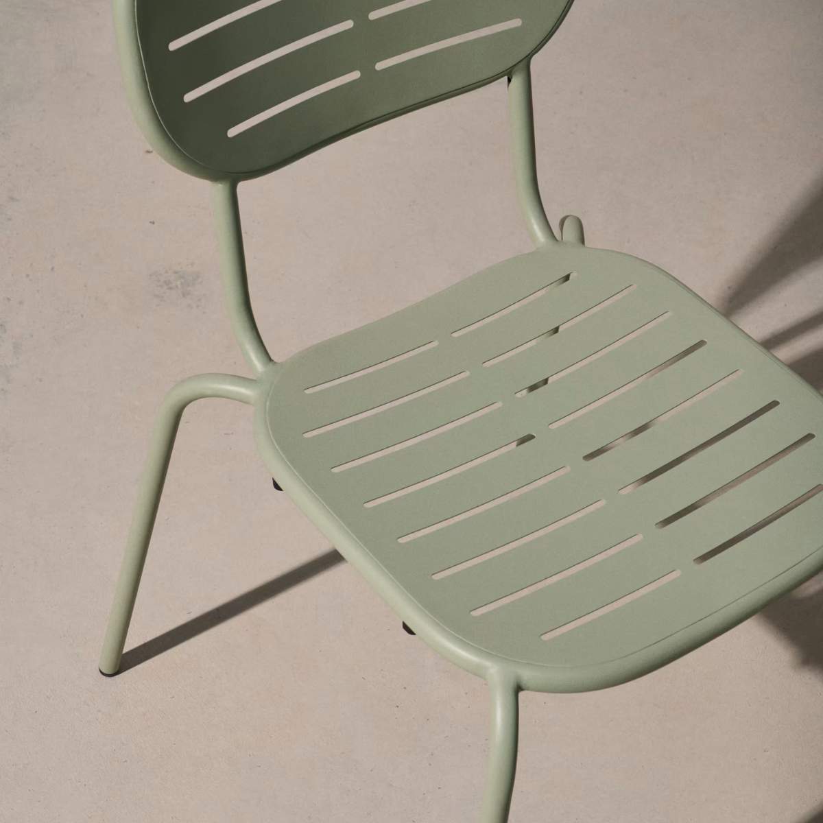 Kave Home Brai stackable outdoor chair in burgundy galvanised steel