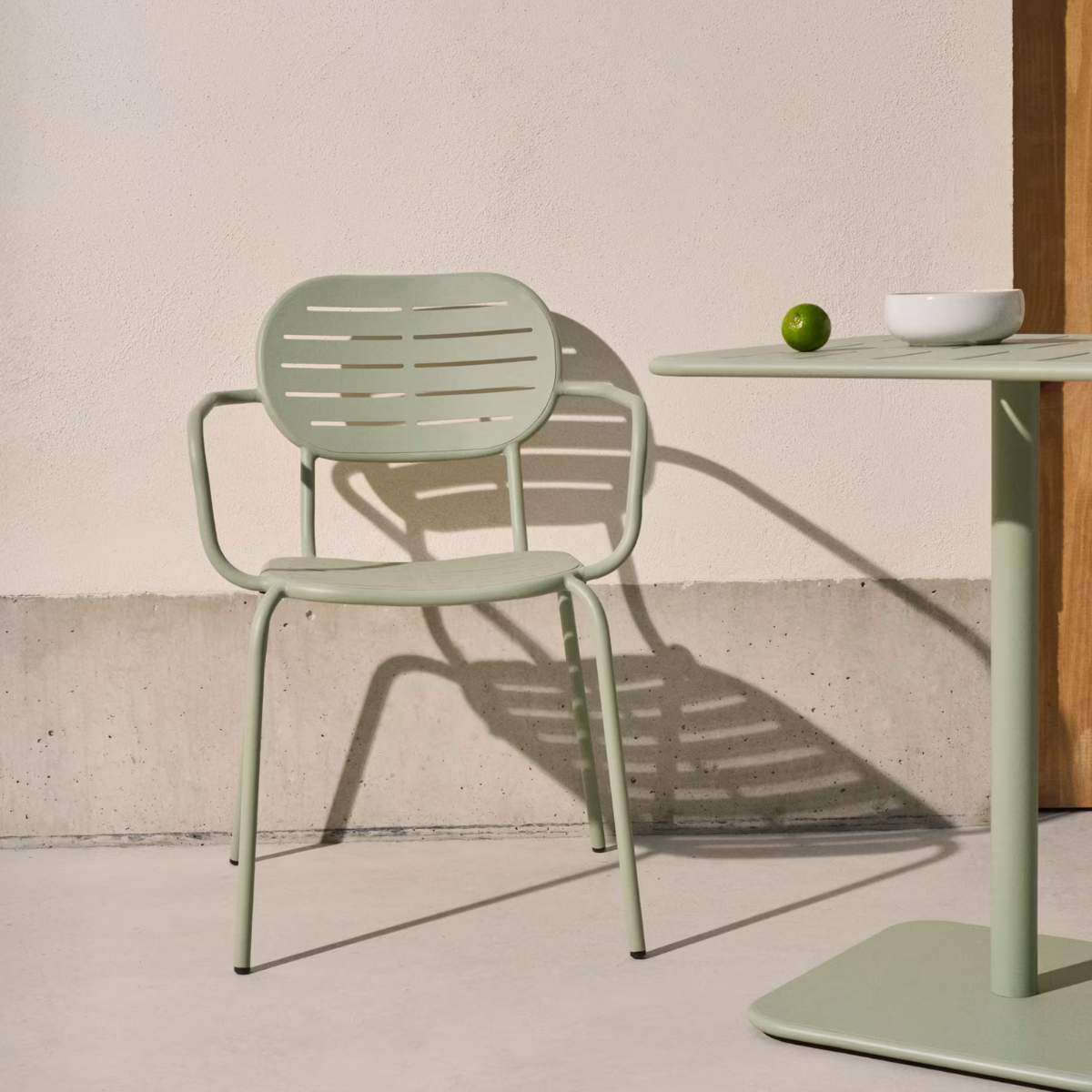 Kave Home Brai stackable outdoor chair with armrests in taupe galvanised steel