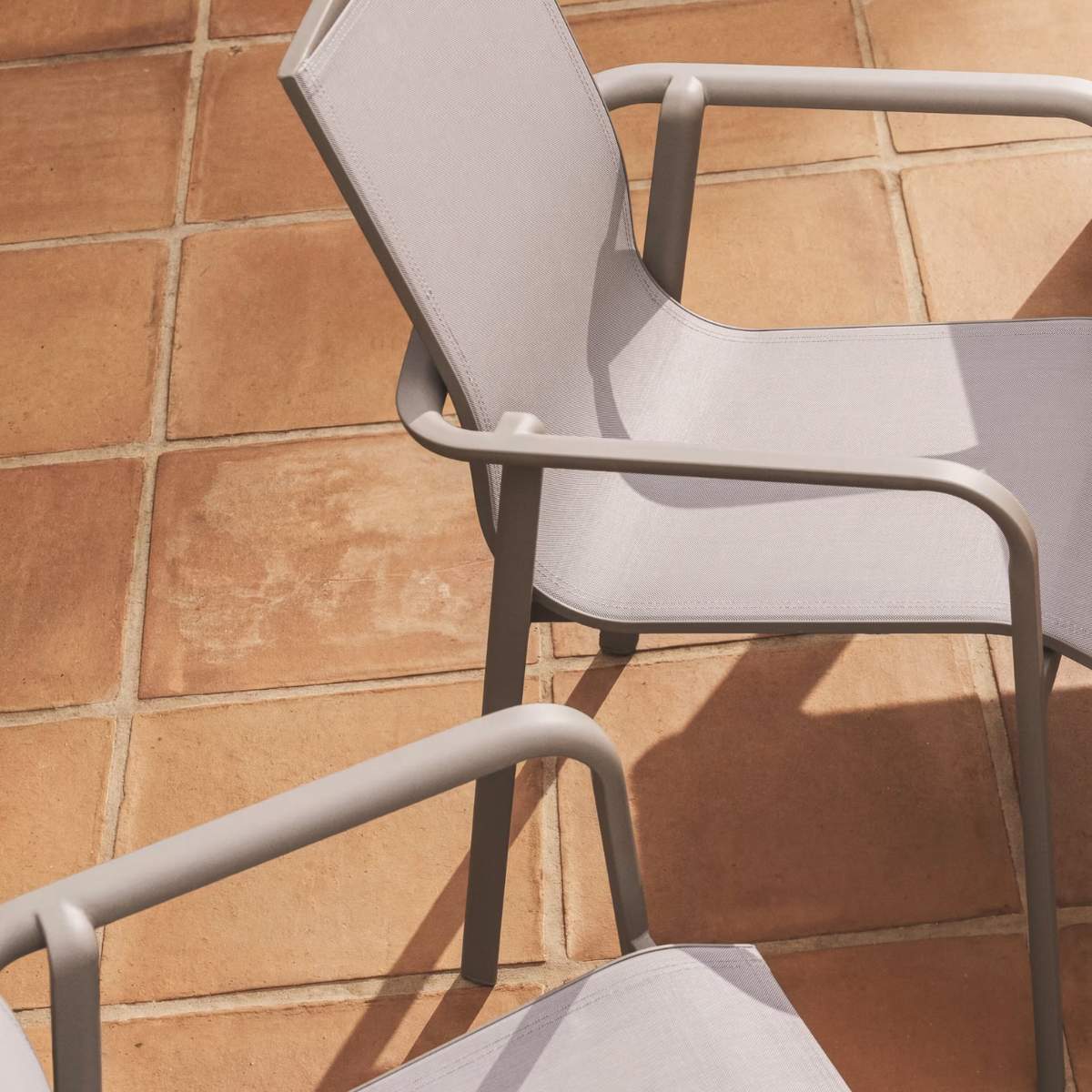 Kave Home Canea stackable outdoor chair in beige texteline and ecru aluminium