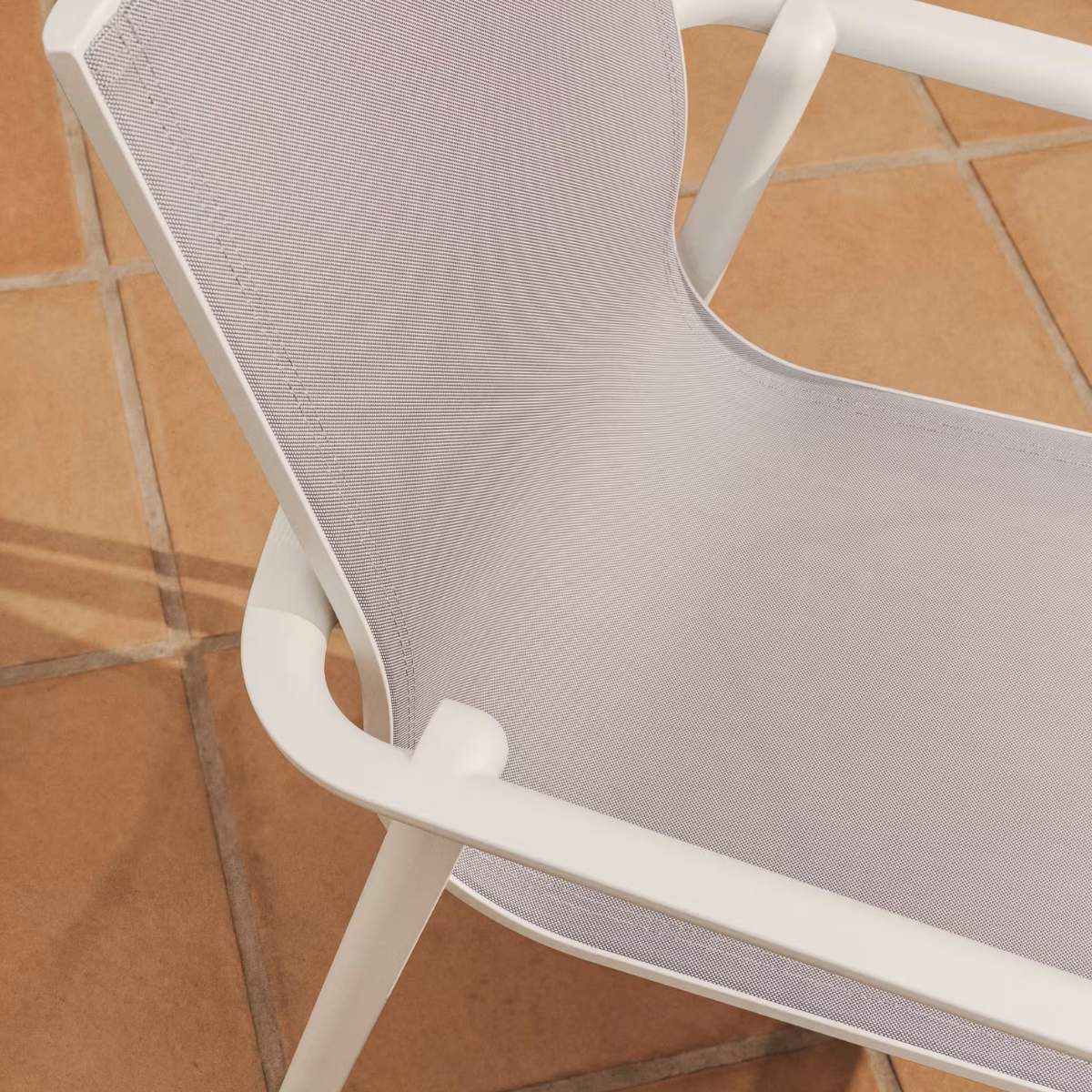 Kave Home Canea stackable outdoor chair in beige texteline and ecru aluminium