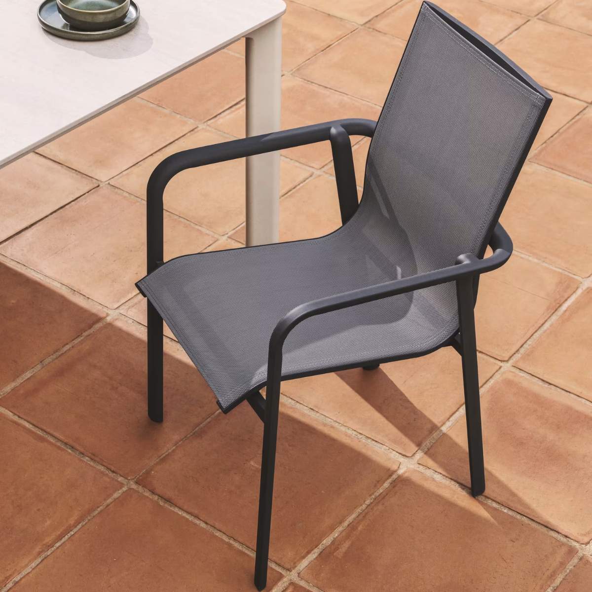 Kave Home Canea stackable outdoor chair in beige texteline and ecru aluminium