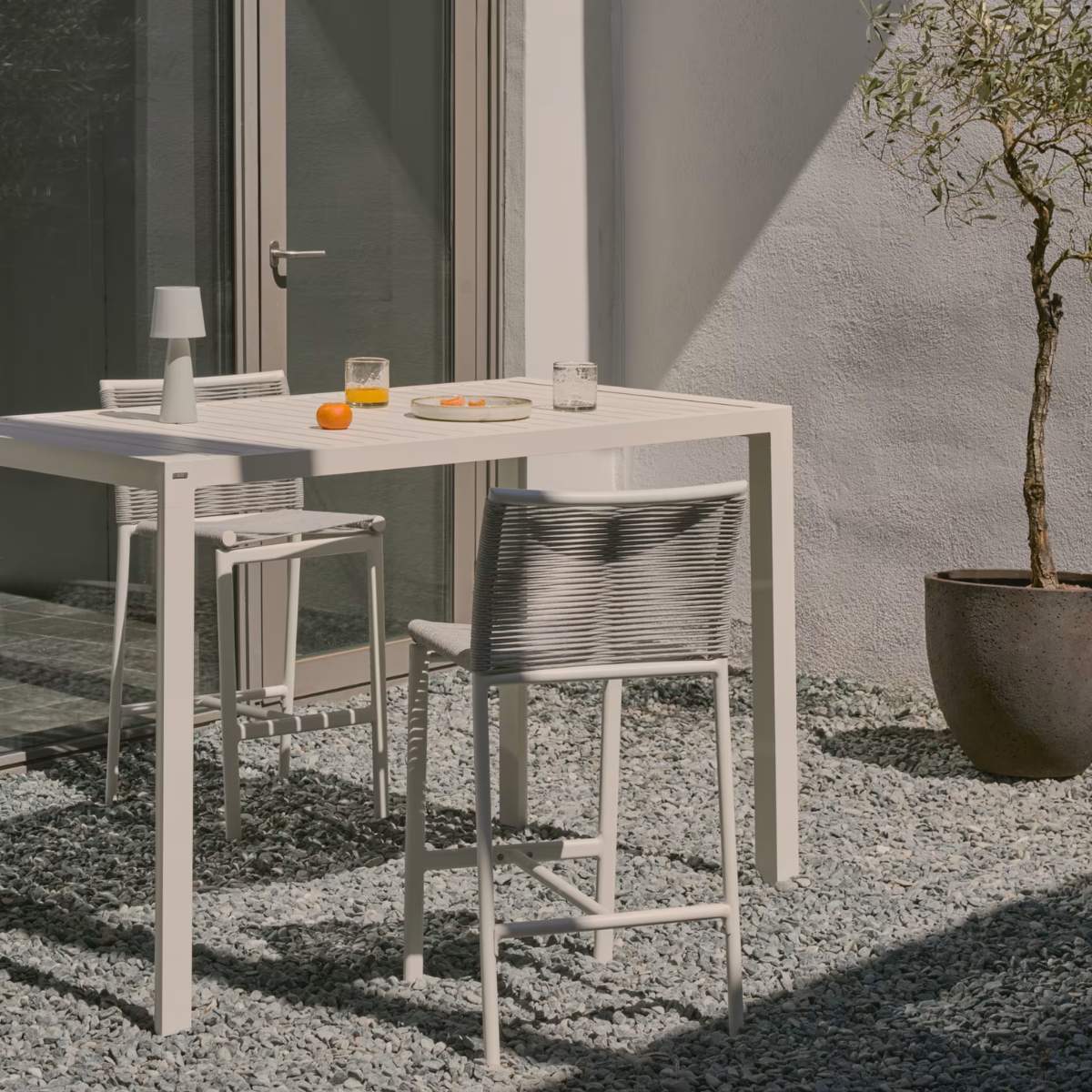Kave Home Culip aluminium outdoor bar table in powder coated white finish, 150 x 77 cm