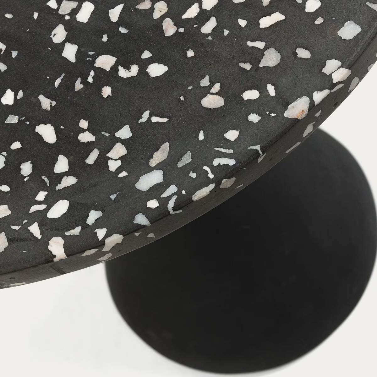 Kave Home Delano black terrazzo side table with steel legs in a black finish, Ø 40 cm