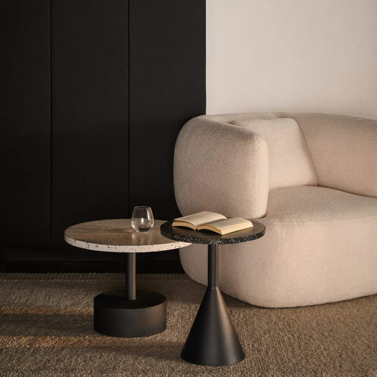 Kave Home Delano black terrazzo side table with steel legs in a black finish, Ø 40 cm