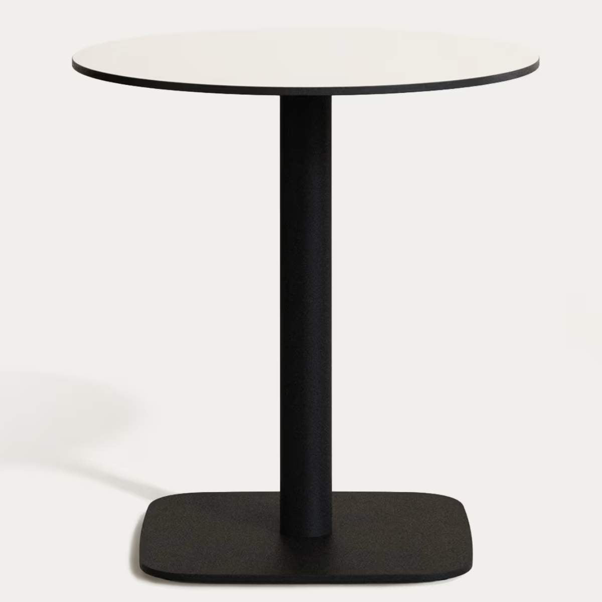 Kave Home Dina round outdoor table in white with metal legal in a painted black finish, Ø 68x70 cm