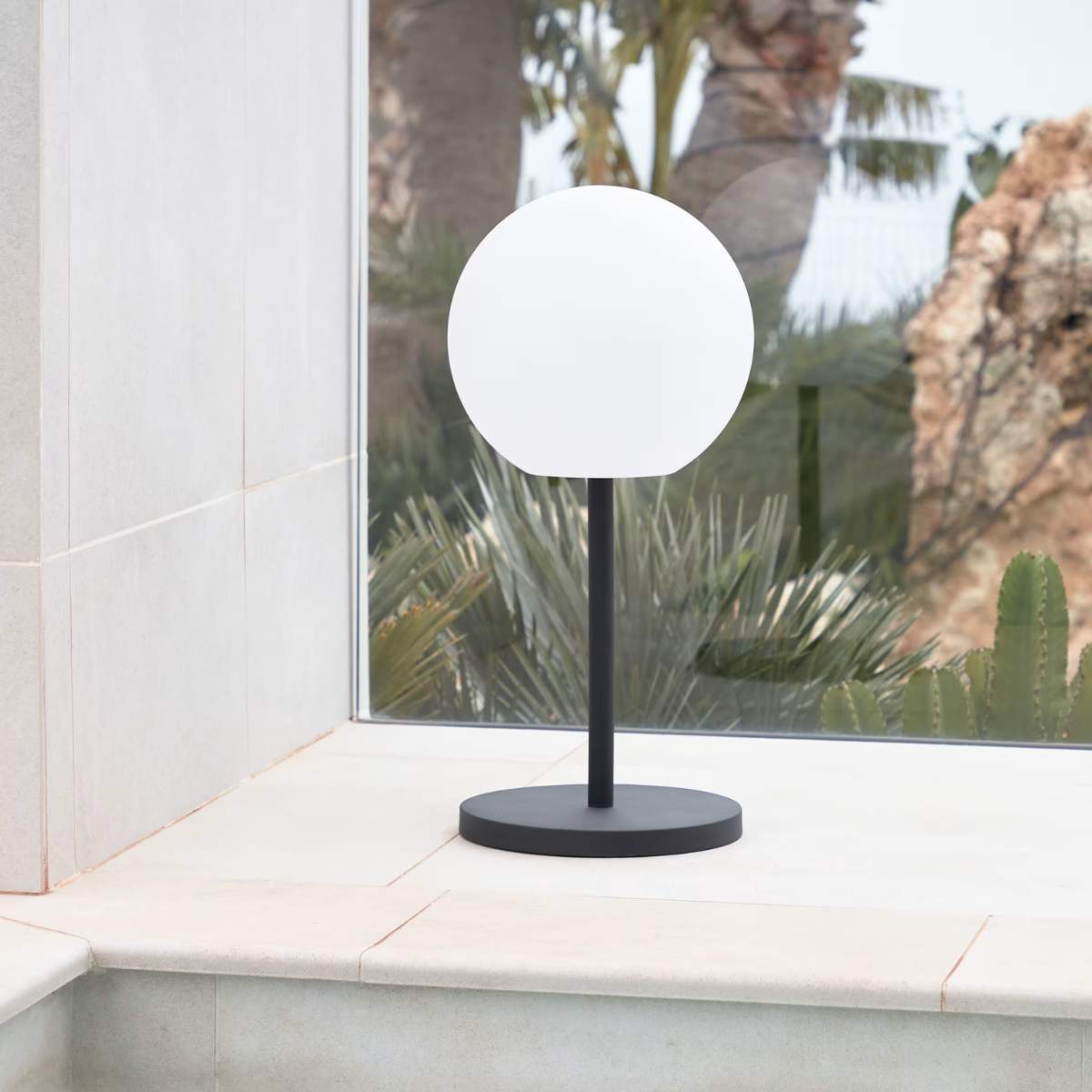 Kave Home Outdoor Dinesh table lamp in black steel