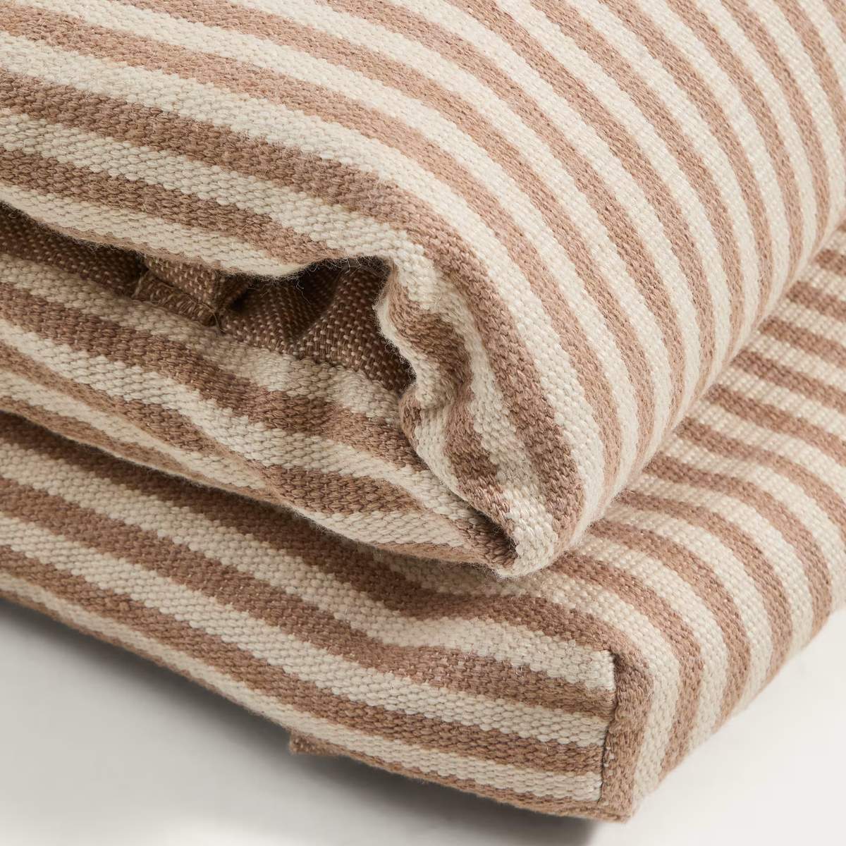 Kave Home Dirome orange striped 100% PET sun lounger cushion 50 x 175cm