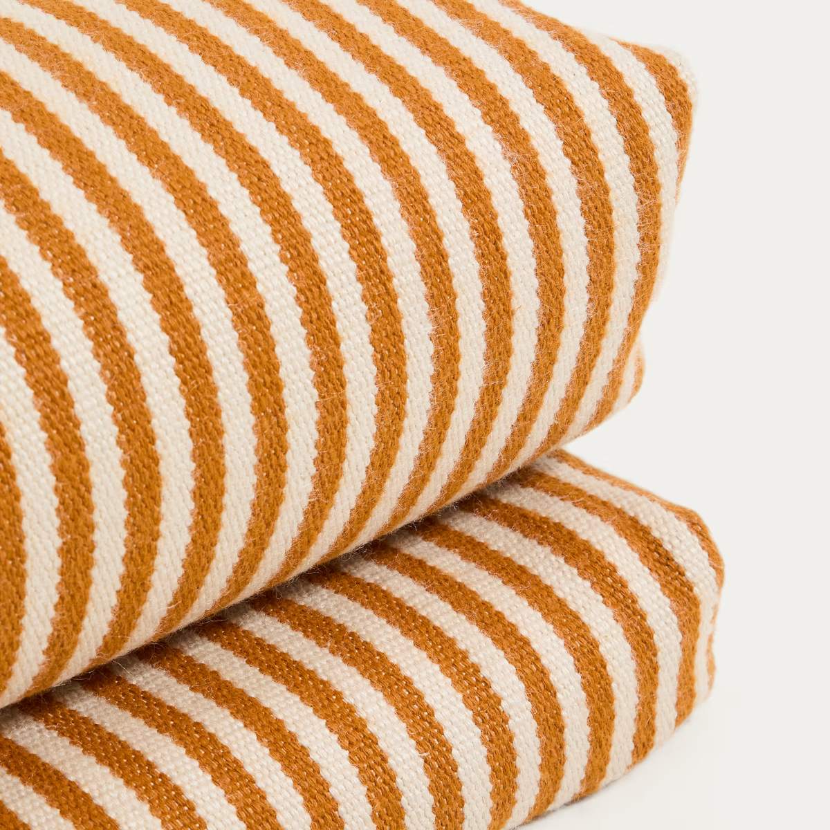 Kave Home Dirome orange striped 100% PET sun lounger cushion 50 x 175cm