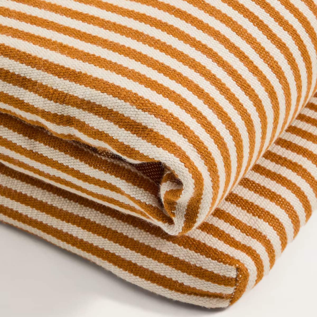 Kave Home Dirome orange striped 100% PET sun lounger cushion 50 x 175cm