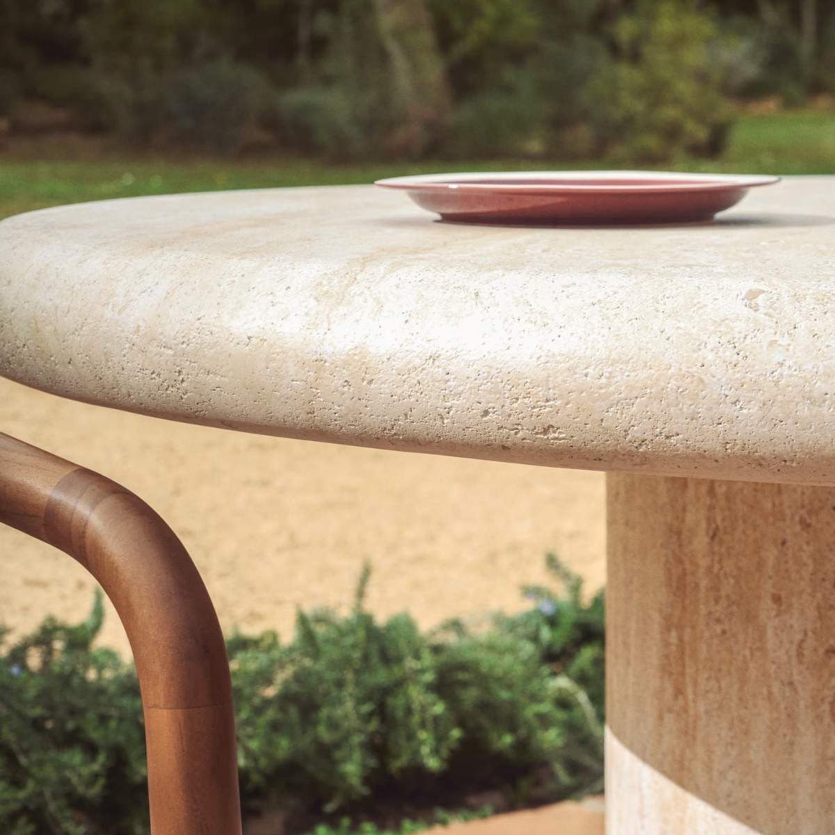 Kave Home Drasi round concrete table with travertine-effect finish Ø122cm