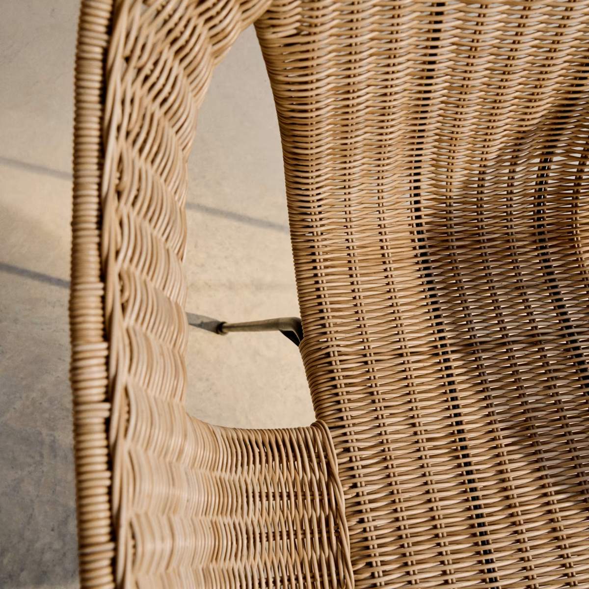 Kave Home Eltiera stackable chair in synthetic rattan with black steel frame