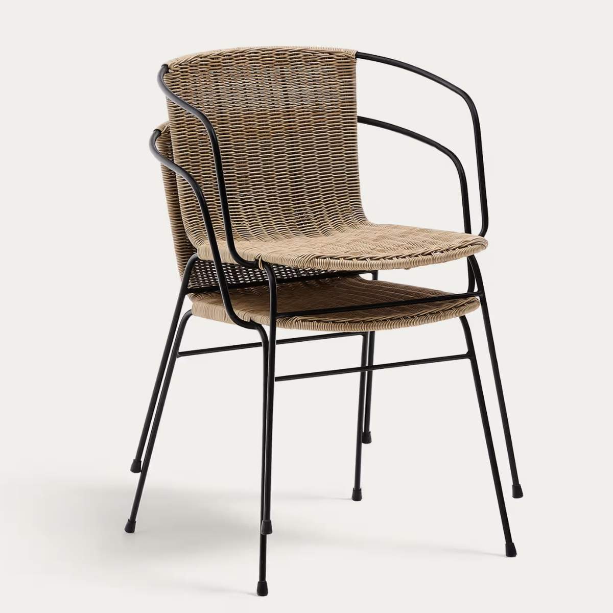 Kave Home Eltiera stackable chair in synthetic rattan with black steel frame and armrests