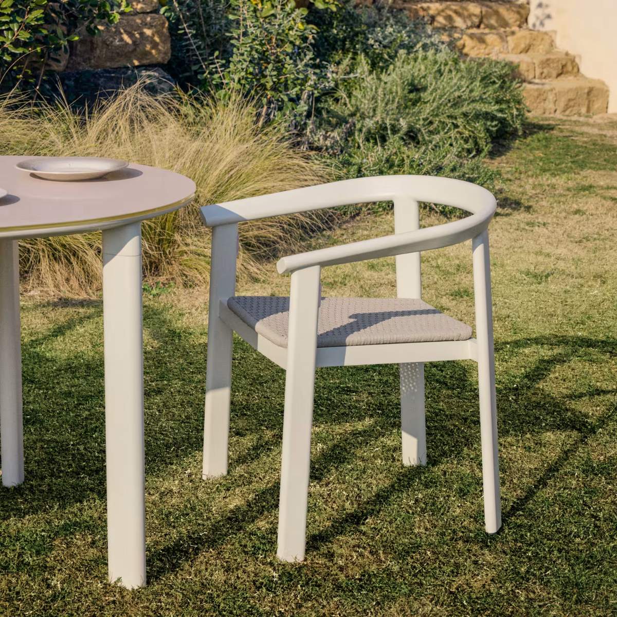 Kave Home Erice set of 6 aluminium and rope cord stackable chairs and a table in ecru aluminium and tempered glass 230 x 100cm