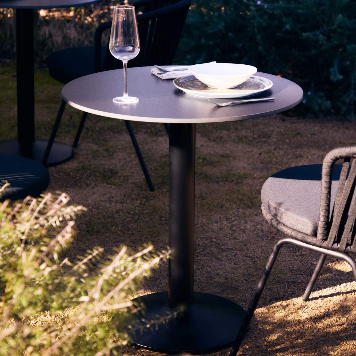 Kave Home Esilda round outdoor table in black with metal leg in a painted black finish, Ø 90 x 70 cm