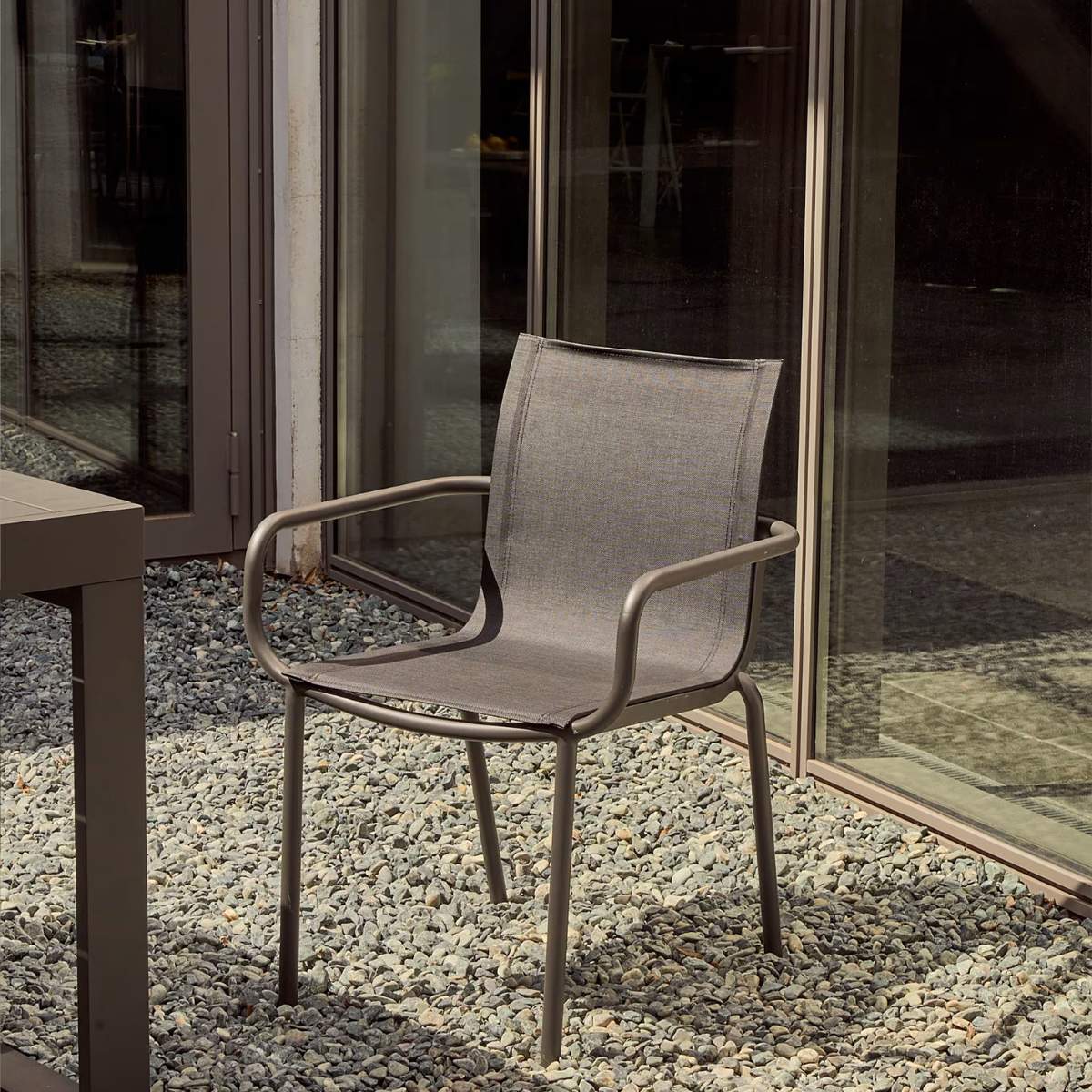 Kave Home Galdana stackable outdoor chair in aluminium with light grey painted finish