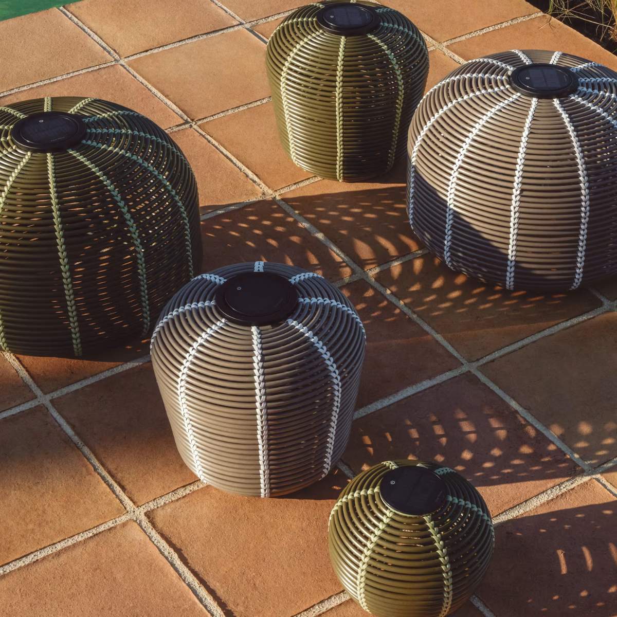 Kave Home Garoina outdoor solar LED table lamp in taupe synthetic rattan Ø50cm