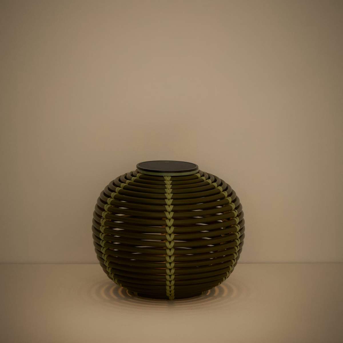 Kave Home Garoina outdoor solar LED table lamp in taupe synthetic rattan Ø25cm