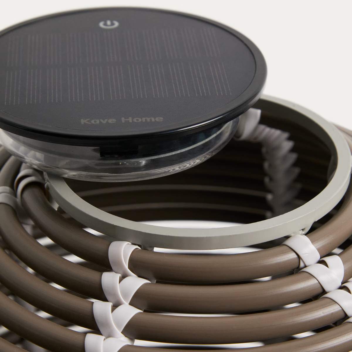 Kave Home Garoina outdoor solar LED table lamp in taupe synthetic rattan Ø25cm