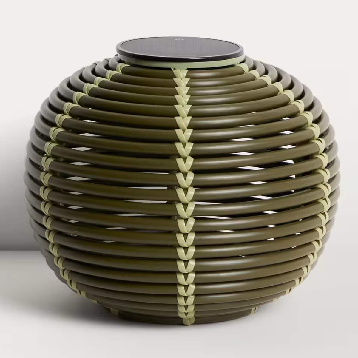 Kave Home Garoina outdoor solar LED table lamp in taupe synthetic rattan Ø25cm