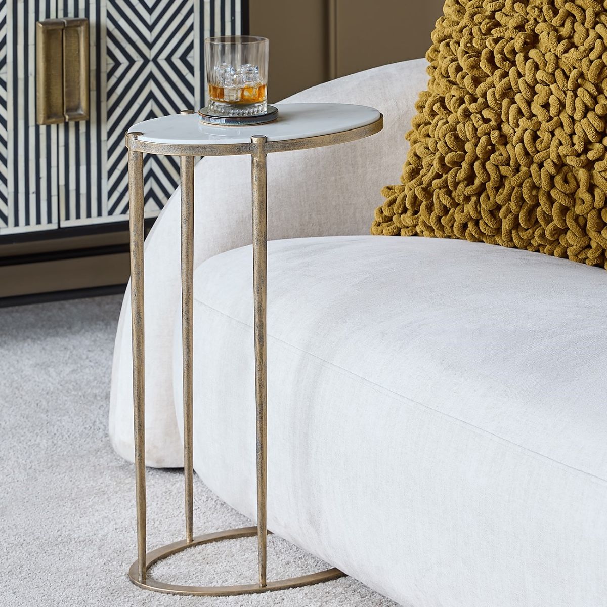 Libra Interiors Iota Oval Accent Table White Banswara Marble Aged Champagne