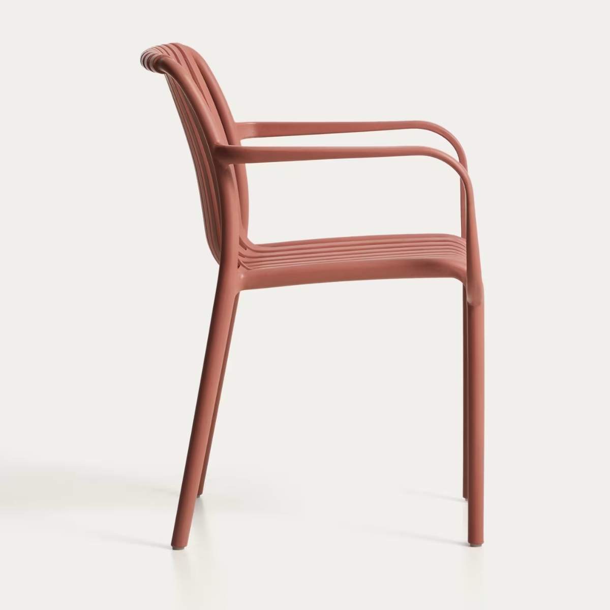Kave Home Isabellini stackable outdoor chair in terracotta
