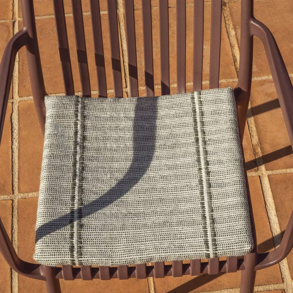 Kave Home Isabellini stackable outdoor chair in terracotta