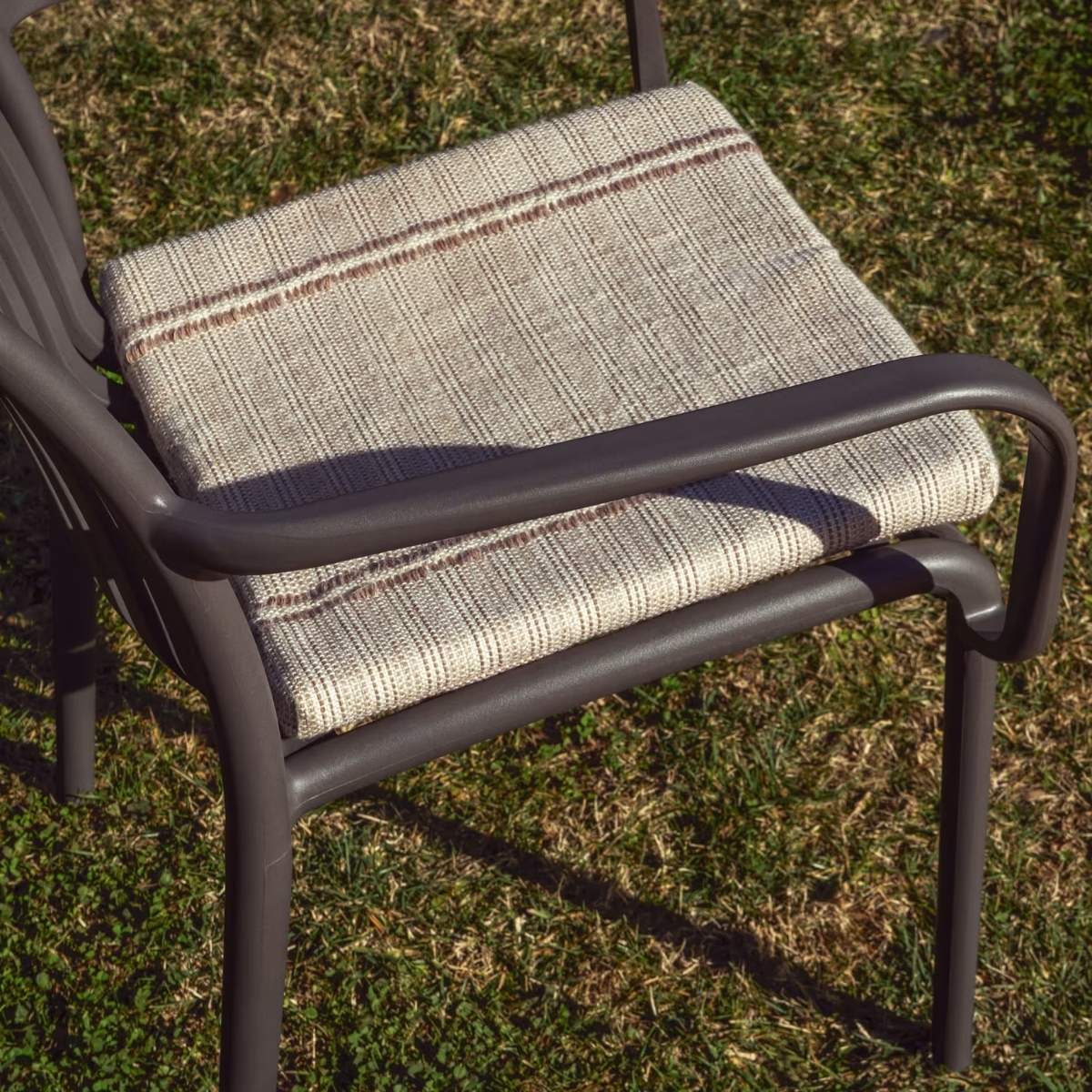Kave Home Isabellini stackable outdoor chair in terracotta