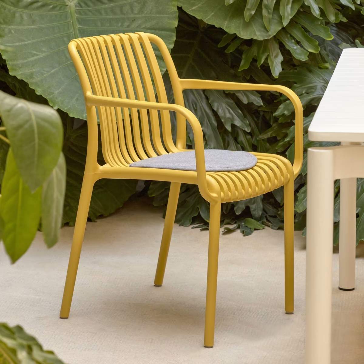 Kave Home Isabellini stackable outdoor chair in terracotta