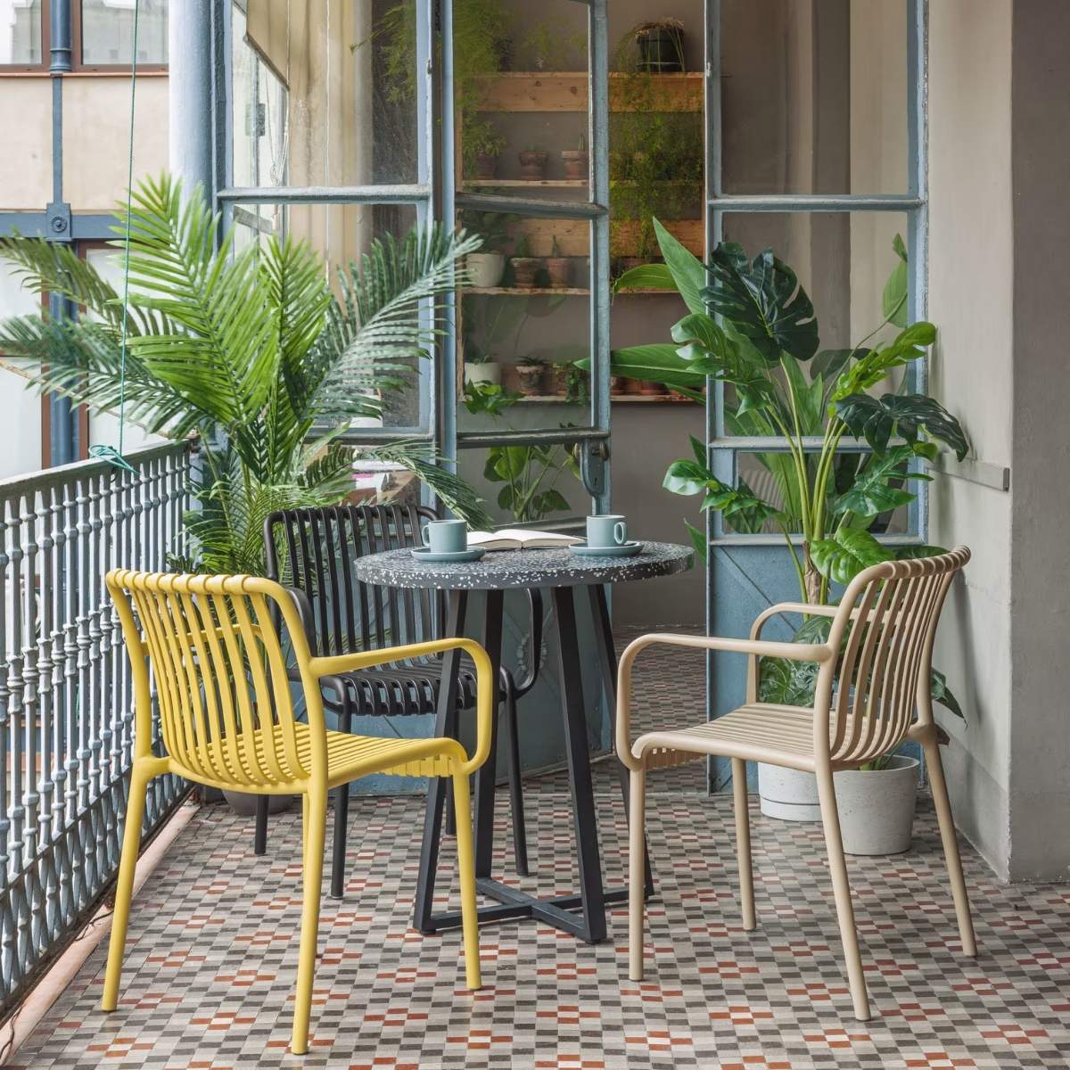 Kave Home Isabellini stackable outdoor chair in terracotta