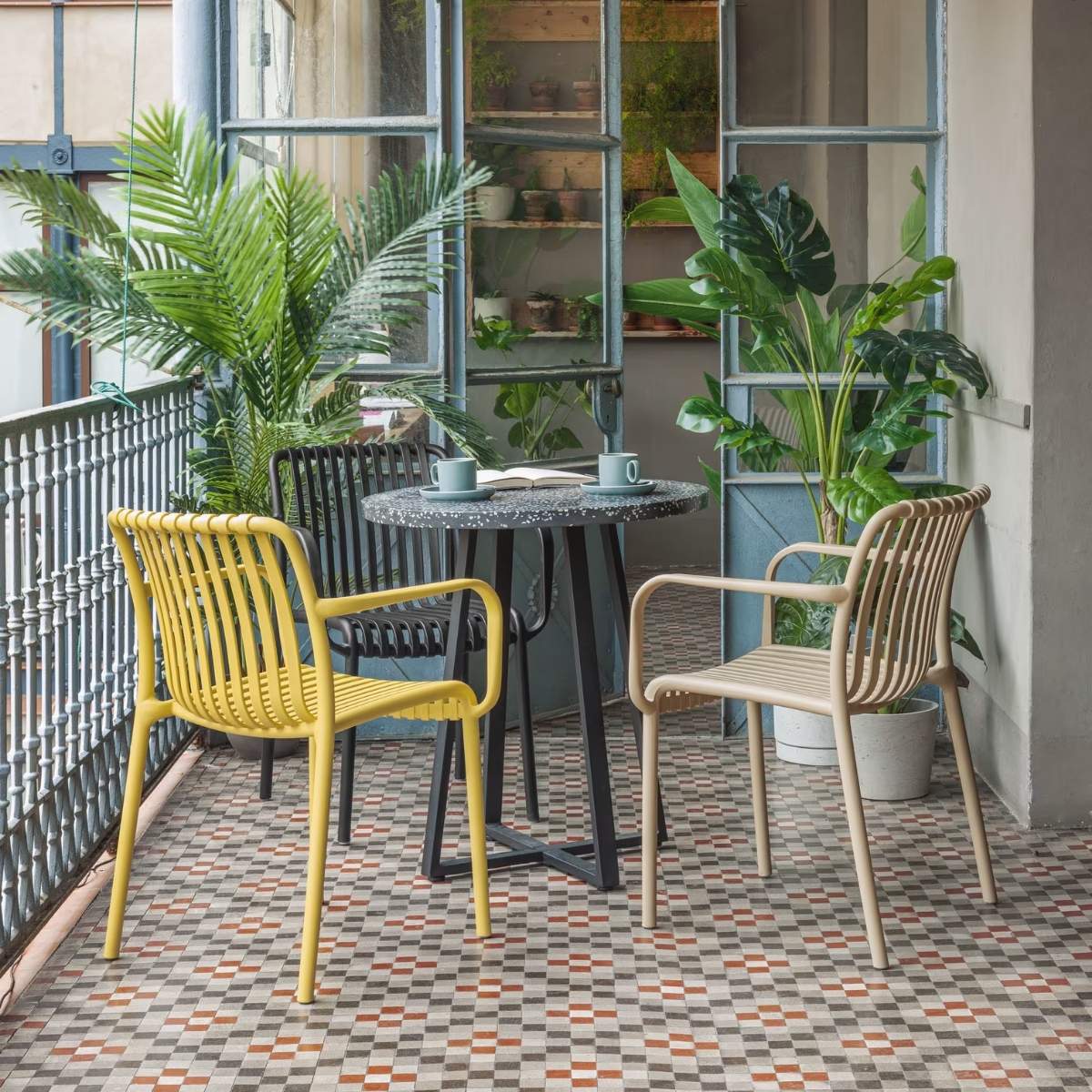 Kave Home Isabellini stackable outdoor chair in terracotta